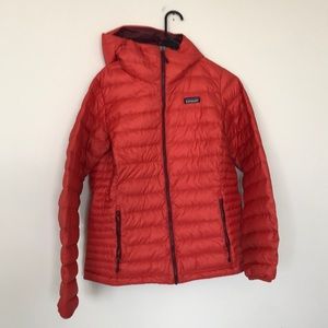 red hooded puffy patagonia jacket